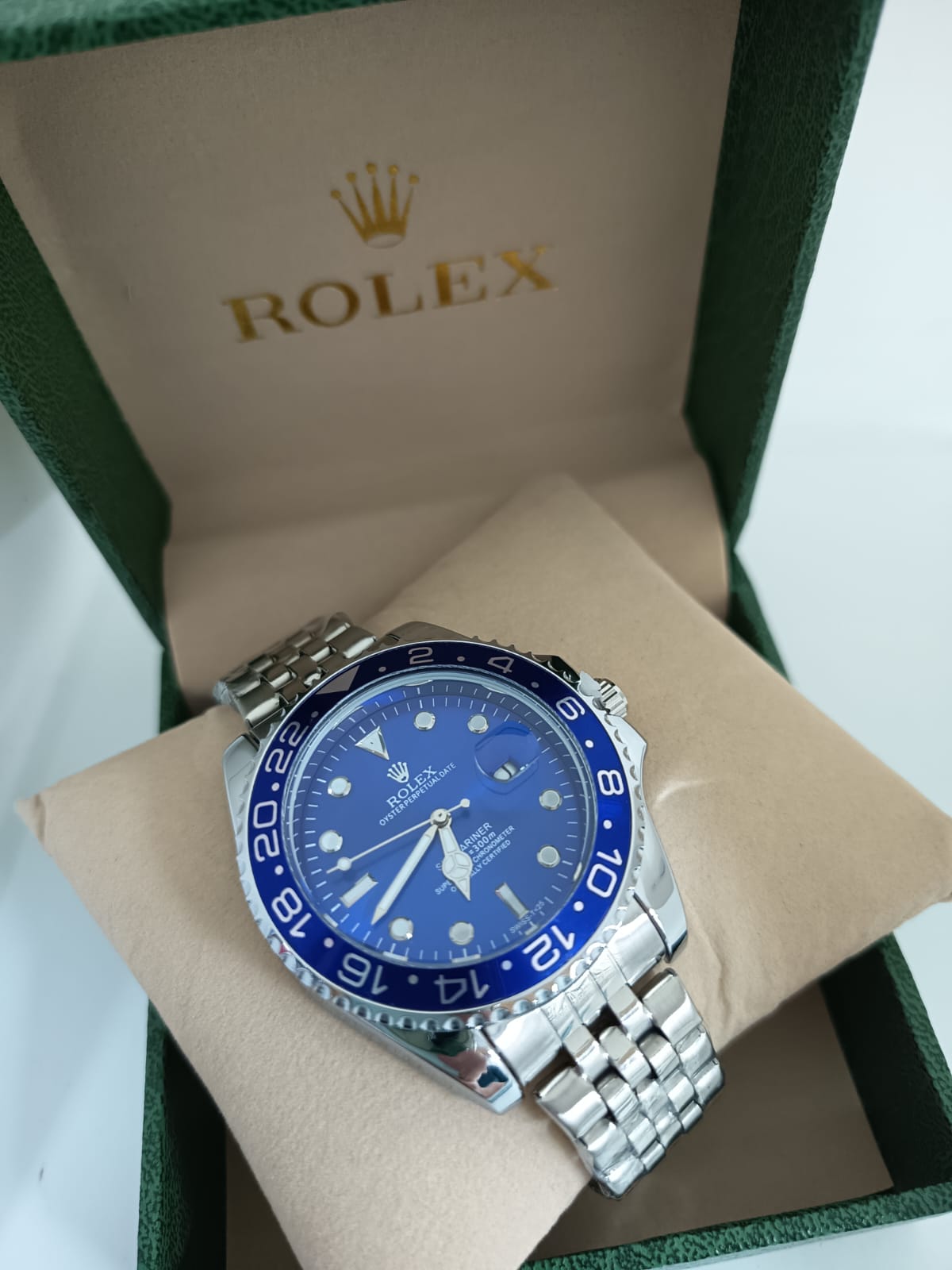 Rolex Oyster Perpetual Date plateado pantalla azul bisel azul