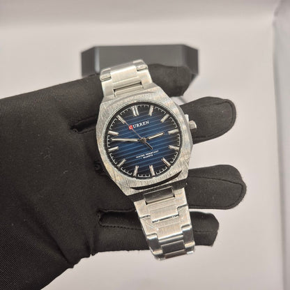 Reloj Curren Geométrico Plateado Dial Azul