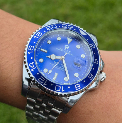 Rolex Oyster Perpetual Date plateado pantalla azul bisel azul