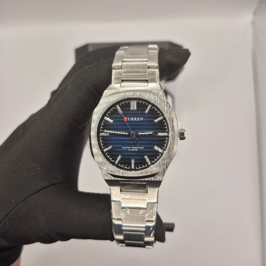 Reloj Curren Geométrico Plateado Dial Azul